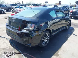 2014 Scion tC with VIN JTKJF5C71E3072199, listed as a IAAI auction lot 41956178 with 154,730 mi miles. Bid and sale history available at carsss.com. Image 4.