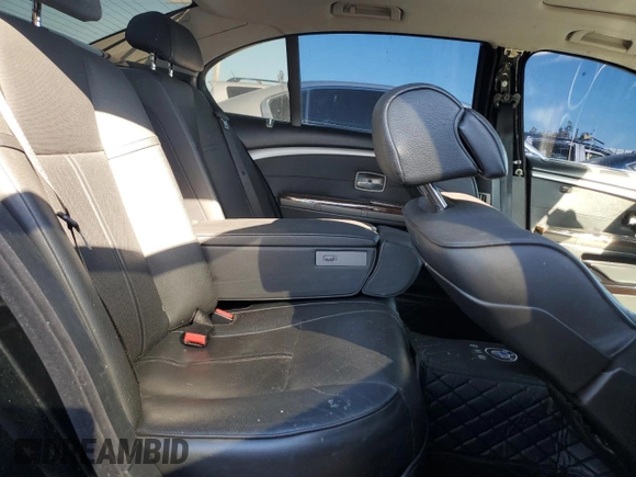 2006 BMW 7 Series 750Li with VIN WBAHN83516DT32814, listed as a Copart auction lot 74359784 with 117,000 mi miles and Salvage Title. Bid and sale history available at carsss.com. Image 10.