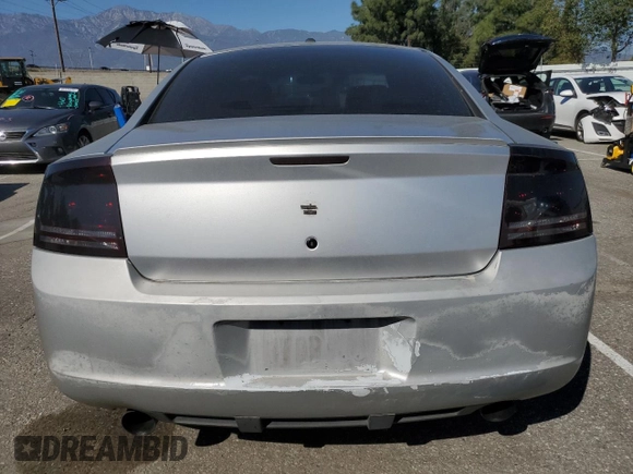 2006 Dodge Charger with VIN 2B3KA43G56H390329, listed as a Copart auction lot 46658235 with 252,522 mi miles and Salvage Title. Bid and sale history available at DreamBid. Image 6.