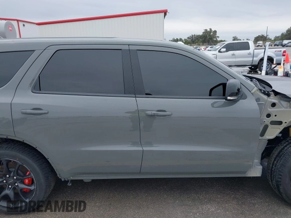 2021 Dodge Durango SRT Hellcat with VIN 1C4SDJH92MC605759, listed as a IAAI auction lot 41639174 with 4,800 mi miles and . Bid and sale history available at DreamBid. Image 14.