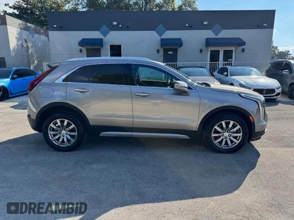 2023 Cadillac XT4 AWD Premium Luxury z VIN 1GYFZDR40PF108407, wystawiony jako Copart lot #47146185 z przebiegiem 8 724 mil mil oraz Nie do naprawy • Non repairable. Historia ofert i sprzedaży dostępna na DreamBid. Obrazek 13.