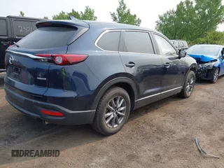 2023 Mazda CX-9 Touring with VIN JM3TCBCY6P0642838, listed as a IAAI auction lot 42407123 with 15,181 mi miles and . Bid and sale history available at DreamBid. Image 4.