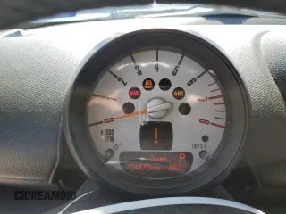 2011 MINI Countryman S with VIN WMWZC5C54BWL53955, listed as a Copart auction lot 52187405 with 124,470 mi miles and Salvage Title. Bid and sale history available at DreamBid. Image 9.