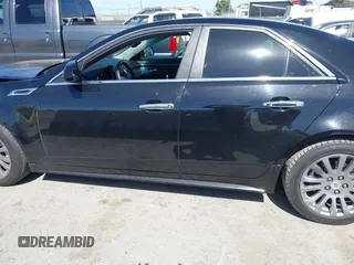 2012 Cadillac CTS Performance z VIN 1G6DJ5E30C0156576, wystawiony jako IAAI lot #42287858 z przebiegiem 106 497 mil mil oraz . Historia ofert i sprzedaży dostępna na DreamBid. Obrazek 15.