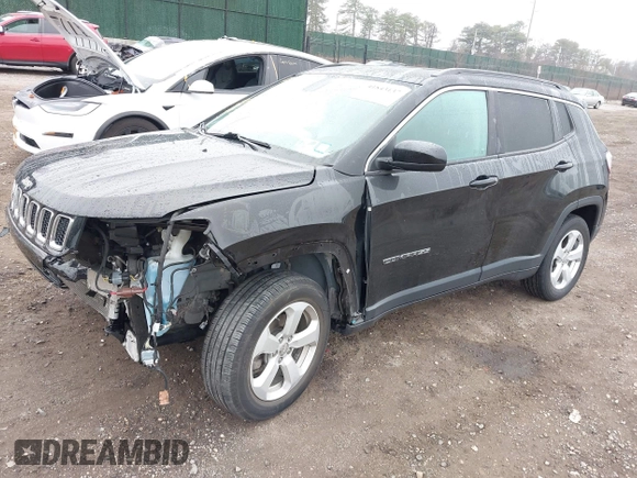 2019 Jeep Compass Latitude with VIN 3C4NJDBB3KT689174, listed as a IAAI auction lot 41843137 with 56,722 mi miles. Bid and sale history available at carsss.com. Image 2.