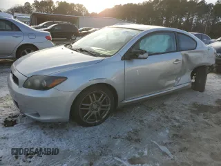 2010 Scion tC z VIN JTKDE3B77A0317623, wystawiony jako Copart lot #87901045 z przebiegiem Nie podano mil oraz Szkoda całkowita • Salvage title. Historia ofert i sprzedaży dostępna na DreamBid. Obrazek 1.