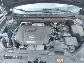 2016 Mazda CX-5 Grand Touring with VIN JM3KE2DY1G0708572, listed as a IAAI auction lot 41685298 with 109,427 mi miles. Bid and sale history available at carsss.com. Image 10.