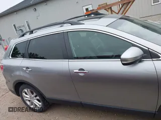 2012 Mazda CX-9 Grand Touring z VIN JM3TB3DA0C0337713, wystawiony jako IAAI lot #42368488 z przebiegiem 184 220 mil mil oraz . Historia ofert i sprzedaży dostępna na DreamBid. Obrazek 13.