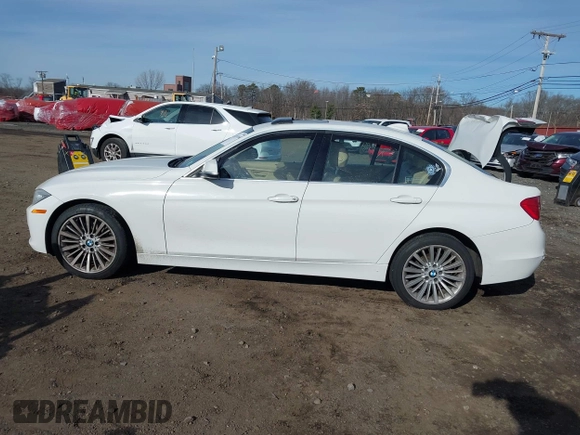 2014 BMW 3 Series 335i xDrive with VIN WBA3B9C52EJ466045, listed as a IAAI auction lot 41281384 with 136,329 mi miles. Bid and sale history available at carsss.com. Image 14.