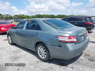 2010 Toyota Camry with VIN 4T1BF3EKXAU555983, listed as a IAAI auction lot 42112803 with 125,061 mi miles and . Bid and sale history available at DreamBid. Image 3.