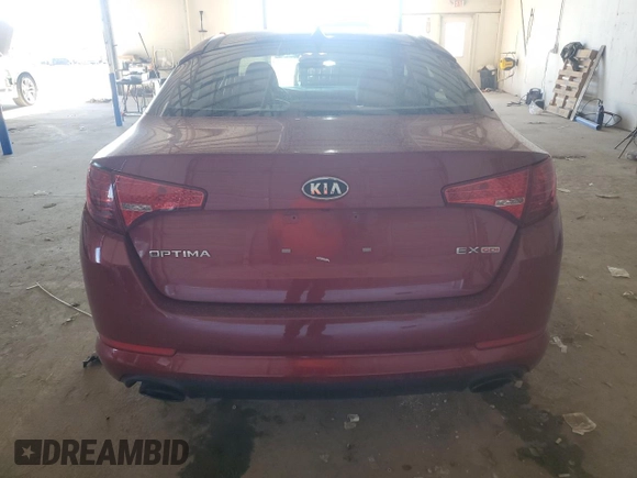 2012 Kia Optima EX with VIN 5XXGN4A77CG053039, listed as a Copart auction lot 48676705 with 114,501 mi miles and Salvage Title. Bid and sale history available at DreamBid. Image 6.
