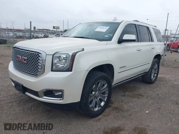 2015 GMC Yukon Denali z VIN 1GKS1CKJ3FR713531, wystawiony jako IAAI lot #41866691 z przebiegiem 157 666 mil mil oraz . Historia ofert i sprzedaży dostępna na DreamBid. Obrazek 2.