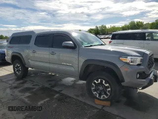 2020 Toyota Tacoma SR5 with VIN 3TMDZ5BN6LM097302, listed as a Copart auction lot 57503895 with 77,212 mi miles and Salvage title. Bid and sale history available at DreamBid. Image 4.