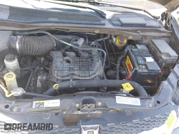 2014 Dodge Grand Caravan SXT with VIN 2C4RDGCG7ER265931, listed as a IAAI auction lot 42141644 with 205,968 mi miles and . Bid and sale history available at DreamBid. Image 10.