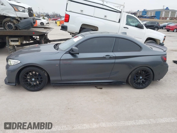 2014 BMW 2 Series M235i with VIN WBA1J7C57EVW84554, listed as a IAAI auction lot 41564175 with 121,632 mi miles and . Bid and sale history available at carsss.com. Image 14.