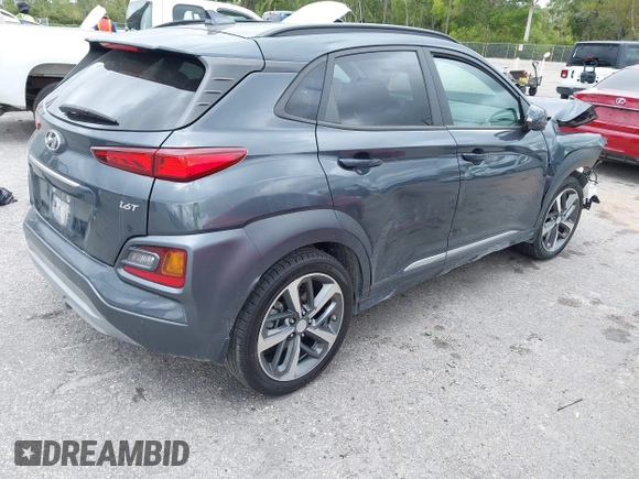 2020 Hyundai Kona Ultimate with VIN KM8K53A55LU549563, listed as a IAAI auction lot 41714066 with 101,444 mi miles. Bid and sale history available at carsss.com. Image 4.