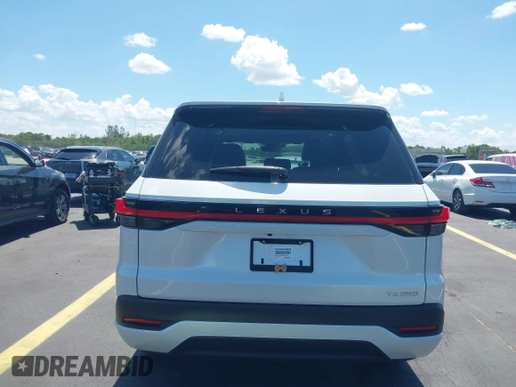 2025 Lexus TX 350 with VIN 5TDAAAA69SS014733, listed as a IAAI auction lot 42481473 with 1,592 mi miles and . Bid and sale history available at DreamBid. Image 17.