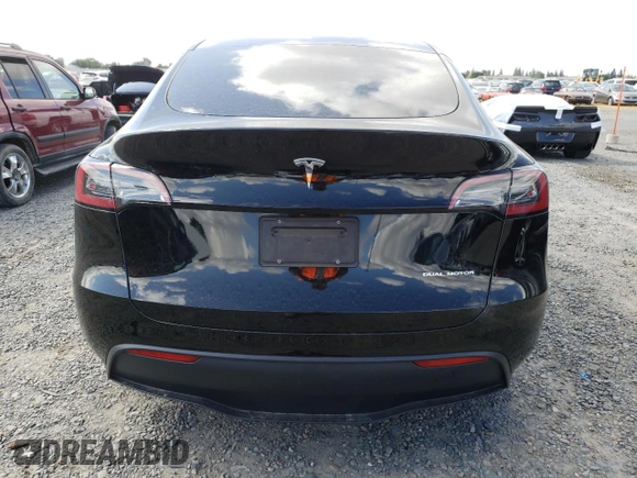 2024 Tesla Model Y Long Range с VIN 7SAYGAEE6RF127846, выставлен на аукционе Copart как лот 56968035 с пробегом 23 328 миль миль и Списание • Salvage title. История ставок и продаж доступна на DreamBid. Изображение 6.