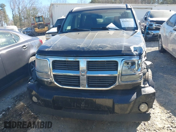2007 Dodge Nitro SLT z VIN 1D8GU58K87W555759, wystawiony jako IAAI lot #41690213 z przebiegiem 196 779 mil mil oraz . Historia ofert i sprzedaży dostępna na DreamBid. Obrazek 12.
