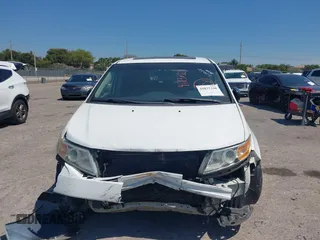 2012 Honda Odyssey EX-L with VIN 5FNRL5H61CB019215, listed as a IAAI auction lot 41837320 with 248,498 mi miles and . Bid and sale history available at DreamBid. Image 13.