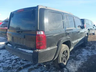2007 Jeep Commander Sport with VIN 1J8HG48K37C647814, listed as a IAAI auction lot 41428248 with 224,137 mi miles. Bid and sale history available at carsss.com. Image 4.