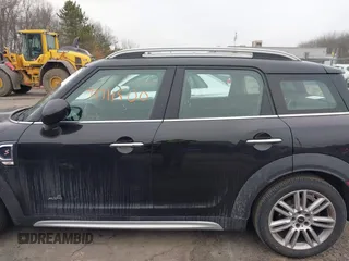2019 MINI Countryman Cooper S with VIN WMZYT5C58K3J87679, listed as a IAAI auction lot 41711500 with 74,433 mi miles. Bid and sale history available at carsss.com. Image 14.