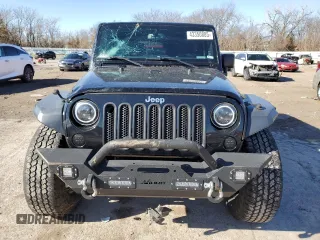 2016 Jeep Wrangler Black Bear with VIN 1C4AJWAG9GL230693, listed as a Copart auction lot 43350885 with 75,761 mi miles and Salvage title. Bid and sale history available at DreamBid. Image 5.