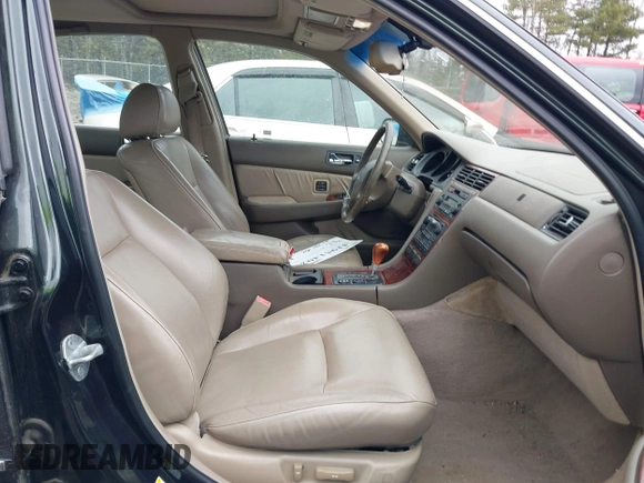 2002 Acura RL with VIN JH4KA96542C005442, listed as a IAAI auction lot 41951402 with 211,734 mi miles. Bid and sale history available at carsss.com. Image 5.