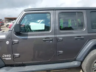 2018 Jeep Wrangler Unlimited Sport S z VIN 1C4HJXDG8JW112639, wystawiony jako IAAI lot #41951965 z przebiegiem 93 853 mil mil oraz . Historia ofert i sprzedaży dostępna na DreamBid. Obrazek 14.