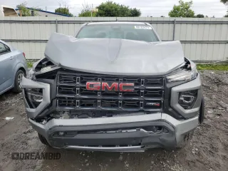 2023 GMC Canyon 4WD AT4 with VIN 1GTP6DEK4P1124937, listed as a Copart auction lot 66103474 with 10,566 mi miles and Salvage Title. Bid and sale history available at carsss.com. Image 5.