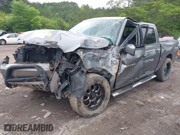 2012 Ram 1500 Sport z VIN 1C6RD7MT2CS108015, wystawiony jako IAAI lot #42093708 z przebiegiem Nie podano mil oraz . Historia ofert i sprzedaży dostępna na DreamBid. Obrazek 14.