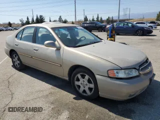 2000 Nissan Altima XE z VIN 1N4DL01D5YC243801, wystawiony jako Copart lot #52642985 z przebiegiem 237 665 mil mil oraz Szkoda całkowita • Salvage title. Historia ofert i sprzedaży dostępna na DreamBid. Obrazek 4.