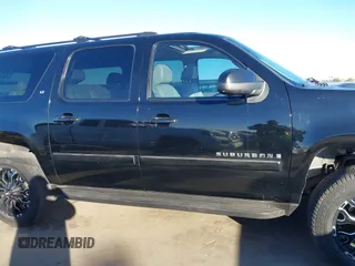 2007 Chevrolet Suburban LT with VIN 3GNGK26K47G206089, listed as a IAAI auction lot 41409657 with 156,789 mi miles and . Bid and sale history available at DreamBid. Image 14.