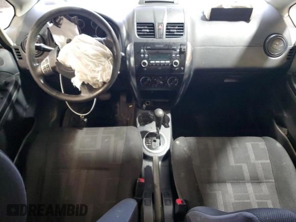 2010 Suzuki SX4 with VIN JS2YC5A49A6310256, listed as a Copart auction lot 73210584 with 135,021 mi miles and Salvage Title. Bid and sale history available at DreamBid. Image 8.