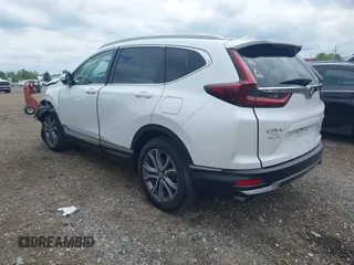 2021 Honda CR-V Touring with VIN 5J6RW2H93ML012016, listed as a IAAI auction lot 42365715 with 55,114 mi miles and . Bid and sale history available at DreamBid. Image 3.