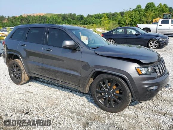 2018 Jeep Grand Cherokee Altitude with VIN 1C4RJEAG4JC145023, listed as a Copart auction lot 59001735 with 127,627 mi miles and Salvage title. Bid and sale history available at DreamBid. Image 4.