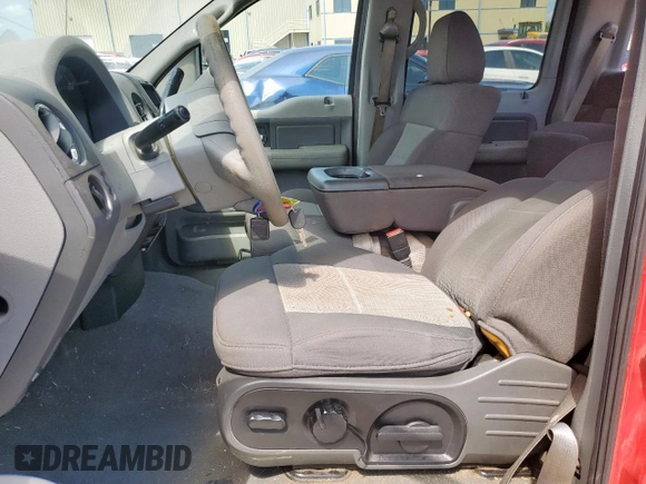 2006 Ford F-150 XLT with VIN 1FTRW12W96FB07681, listed as a Copart auction lot 61033625 with 140,527 mi miles and Salvage title. Bid and sale history available at DreamBid. Image 7.