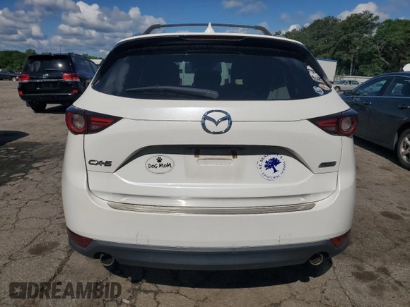 2018 Mazda CX-5 Grand Touring с VIN JM3KFADM3J1351532, выставлен на аукционе Copart как лот 55567405 с пробегом 99 134 миль миль и Списание • Salvage title. История ставок и продаж доступна на DreamBid. Изображение 6.