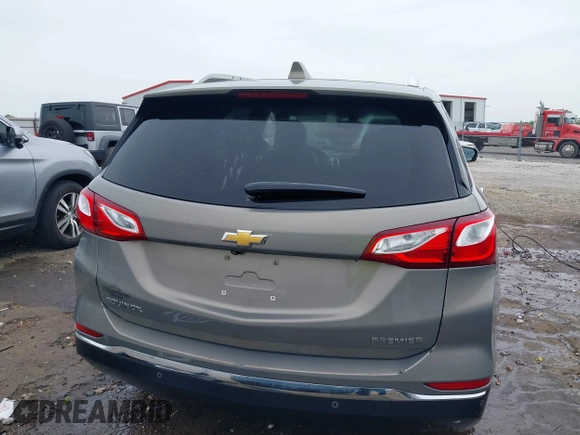 2019 Chevrolet Equinox Premier z VIN 3GNAXNEVXKS503474, wystawiony jako IAAI lot #42084263 z przebiegiem 93 838 mil mil oraz . Historia ofert i sprzedaży dostępna na DreamBid. Obrazek 17.