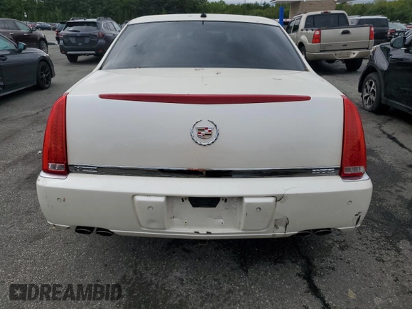 2007 Cadillac DTS V8 z VIN 1G6KD57Y57U215417, wystawiony jako Copart lot #57962455 z przebiegiem 87 592 mil mil oraz Tytuł czysty. Historia ofert i sprzedaży dostępna na DreamBid. Obrazek 6.