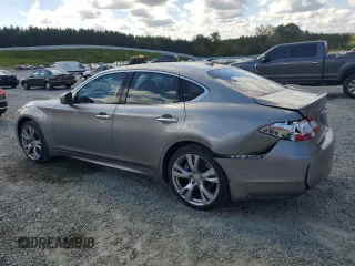 2011 Infiniti M with VIN JN1BY1AP9BM322203, listed as a Copart auction lot 73536594 with 253,376 mi miles and Salvage Title. Bid and sale history available at DreamBid. Image 2.