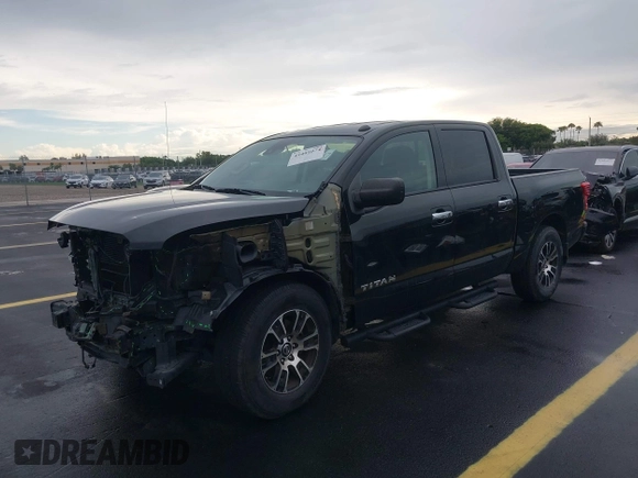 2021 Nissan Titan SV with VIN 1N6AA1EF4MN503458, listed as a IAAI auction lot 42401074 with 53,558 mi miles and . Bid and sale history available at DreamBid. Image 2.