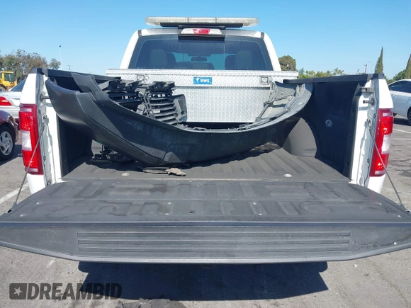2018 Ford F-150 XL z VIN 1FTEX1CBXJFE23719, wystawiony jako IAAI lot #42606957 z przebiegiem 135 354 mil mil oraz . Historia ofert i sprzedaży dostępna na DreamBid. Obrazek 18.