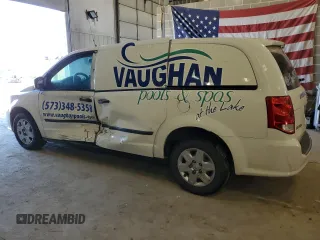 2013 Ram Cargo Van Tradesman with VIN 2C4JRGAGXDR759619, listed as a Copart auction lot 49061485 with 168,842 mi miles and Salvage Title. Bid and sale history available at carsss.com. Image 2.