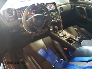 2010 Nissan GT-R Premium с VIN JN1AR5EF7AM231060, выставлен на аукционе Copart как лот 62069125 с пробегом 58 489 миль миль и Чистый • Clean title. История ставок и продаж доступна на DreamBid. Изображение 8.