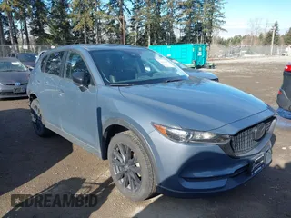 2021 Mazda CX-5 Touring with VIN JM3KFACM6M0483194, listed as a IAAI auction lot 41503907 with 41,237 mi miles. Bid and sale history available at carsss.com. Image 1.
