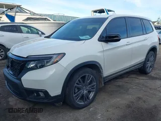 2019 Honda Passport EX-L with VIN 5FNYF8H5XKB008904, listed as a IAAI auction lot 41440706 with 57,317 mi miles and . Bid and sale history available at DreamBid. Image 2.