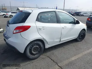 2011 Mazda Mazda2 Sport with VIN JM1DE1HZ5B0117331, listed as a IAAI auction lot 42084291 with 176,619 mi miles. Bid and sale history available at carsss.com. Image 4.