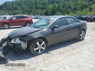 2006 Pontiac G6 GTP z VIN 1G2ZM571764263616, wystawiony jako Copart lot #59471545 z przebiegiem 153 546 mil mil oraz Szkoda całkowita • Salvage title. Historia ofert i sprzedaży dostępna na DreamBid. Obrazek 1.