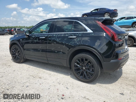 2023 Cadillac XT4 FWD Luxury с VIN 1GYAZAR47PF107473, выставлен на аукционе Copart как лот 59137665 с пробегом 9 198 миль миль и Списание • Salvage title. История ставок и продаж доступна на DreamBid. Изображение 2.